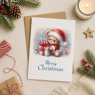Christmas card with picture of teddy bear and gift