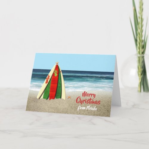 Christmas card with Surfboards on Beach