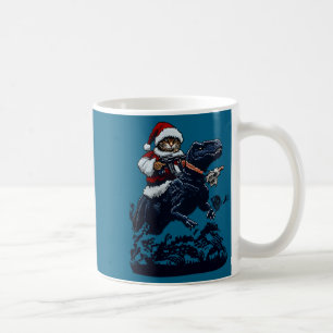 Christmas Cat In Santa Hat Holding A Gun And Dinos Coffee Mug