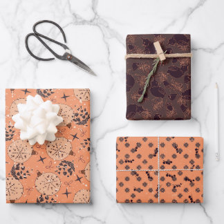 Christmas decorations, stars, cones, birds on wrapping paper sheets