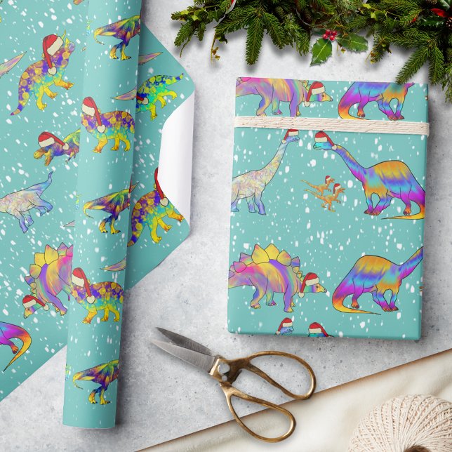 Christmas Dinosaurs in Santa Hats Wrapping Paper (Christmas dinosaurs in Santa hats in the snow pattern fun holiday wrapping paper for dino lovers)