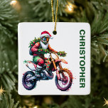 Christmas Dirt Bike Motocross Custom Name Ceramic Ornament<br><div class="desc">Kick up some holiday fun with this dirt bike Christmas ornament! Featuring a rider in action on a dirt bike, decorated with festive pine branches and colorful ornaments, this ornament is perfect for motocross enthusiasts and adventure lovers. Whether you're adding a unique twist to your tree or gifting it to...</div>