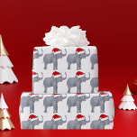 Christmas Elephant Santa Cute Wrapping Paper<br><div class="desc">Cute holiday animals are my favorite part of Christmas. A pretty elephant wearing a red Santa hat and looking happy. This fills me with the Christmas spirit. Personalize this present with the gift recipient's name for a beautiful customized Christmas gift.</div>