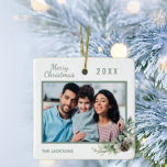 Christmas family photo white cone pine ceramic ornament<br><div class="desc">Personalize and add your own family photo. A green frame decorated with a cone and pine greenery.  Add your family name and year.</div>