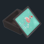 Christmas Flamingo premium gift boxes<br><div class="desc">Stylish design with a retro touch featuring festive pink flamingo wearing a red Santa hat,  stars and palm trees decorated with baubles set against an aqua background. A customizable design for you to personalise with your own text,  images and ideas. An original digital art image created by Quirky Chic.</div>