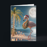 Christmas Flamingo Wearing a Santa Hat Card<br><div class="desc">A festive flamingo wearing a Santa hat and wreath stands on a tropical beach under a full moon 
All text can be changed.</div>