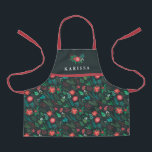 Christmas Floral Pattern Pretty Girls Name Green Apron<br><div class="desc">This beautiful holiday girls apron features a Christmas floral pattern in red, green, teal, and white over a dark green background. We also carry a matching apron in women's size, so mom and daughter can match! A text template is included for personalization, making this apron truly unique! The straps are...</div>