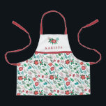 Christmas Floral Pattern Pretty Girls Name White Apron<br><div class="desc">This beautiful holiday girls' apron features a Christmas floral pattern in red, green, and teal, over a white background (the background color can be customized, if desired). We also carry a matching apron in women's size, so mom and daughter can match! A text template is included for personalization, making this...</div>