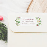 Christmas Foliage & Red Winter Berries Family Name Label<br><div class="desc">Custom Christmas return address labels with your family name and watercolor foliage. This design features your family name and return address in classic serif typography. The text is framed by an illustration of lush greenery and red winter berries. Your family name appears in the same red color as the berries....</div>