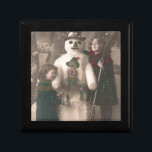 Christmas Girls and Snowman Vintage Photo Jewelry Box<br><div class="desc">A charming antique 1910 French Christmas photo postcard of two pretty,  adorable little girls happily hugging and posing with their festive snowman friend,  as snow floats down upon them. With elegant antique gold lettering wishing a Joyeux Noel.</div>