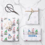 Christmas Gnomes GNOEL Winter Snowflake Wrapping Paper Sheets<br><div class="desc">Coordinated collection of cute,  whimsical watercolor Christmas gnomes with the typography greeting GNOEL and a winter snowflake background. Contact the designer via Zazzle Chat or makeitaboutyoustore@gmail.com if you'd like this design modified,  on another product or would like coordinating items.</div>