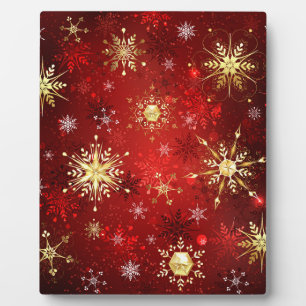 Christmas Golden Snowflakes on Red Background Plaque