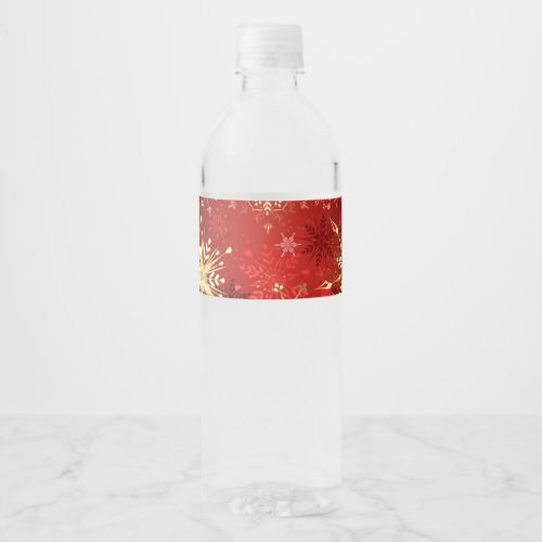 Christmas Golden Snowflakes on Red Background Water Bottle Label