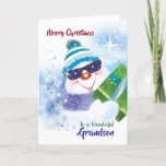 Christmas, Grandson, Cool Snowman in Sunglasses Card<br><div class="desc">A jolly cool snowman wearing dark sunglasses and carrying a present is the original illustration on this cheerful Christmas card for Grandson. Wearing a woolly hat and a big smile,  this cool dude is set against a blue background of snowflakes and falling snow.</div>
