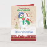 Christmas, Grandson. Cute Snowman and Puppy Holiday Card<br><div class="desc">A sweet Christmas card for a young Grandson. It features an adorable little snow child hugging a cute snow puppy. He is wearing a blue hat, green scarf and red gloves while his puppy is wearing a Santa hat. Snow is falling around them and a decorative Christmas border trims the...</div>