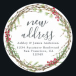 Christmas Greenery New Address Label<br><div class="desc">The Christmas Greenery New Address label features a festive watercolor wreath of winter greenery and red berries surrounding soft charcoal script for a warm holiday look. Perfect for sharing a seasonal move, this round label adds a charming touch to Christmas mailings, new address announcements, and holiday cards. The cozy botanical...</div>