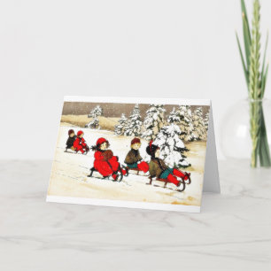 Christmas greeting with kids snow slading holiday card