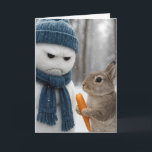 Christmas Grumpy Snowman With a Bunny Card<br><div class="desc">A grumpy snowman wearing a blue hat and scarf stands in a snowy forest as a rabbit holds a carrot beside it,  with snow gently falling around them.
Inside text is editable.</div>