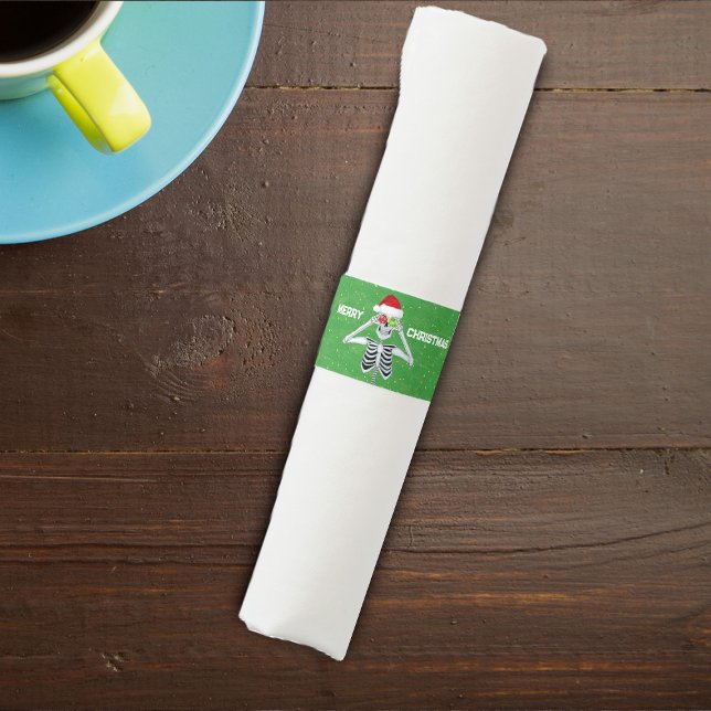 Christmas Happy Skeleton Ornament Eyes Hat Green Napkin Bands (Grinning skeleton ornament eyes Santa Hat on Merry Christmas green paper napkin bands.)