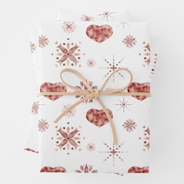 Christmas Holiday Rose Gold Snow and Hearts Wrapping Paper Sheets (In situ)