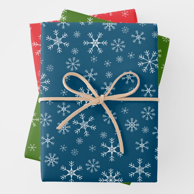Christmas Holiday Snowflakes Red Green Blue White Wrapping Paper Sheets (In situ)