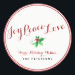 Christmas Holly Joy Peace Love Script Custom Classic Round Sticker<br><div class="desc">Celebrate the season with this beautiful Holiday return address label that features the words JOY PEACE LOVE in an elegant red script font and a sprig of festive watercolored holly below. Personalize by adding your own greeting and name. Beautiful and classic yet simple and trendy, a sticker that's perfect for...</div>
