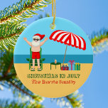 Christmas in July Summer Santa Claus Cute Beach Ceramic Ornament<br><div class="desc">This cute custom Christmas in July ornament makes a perfect summer party gift for a beach bash or pool gathering. Make it a fun north pole themed extravaganza with Santa Claus in his swimming trunks next to a red and white striped beach umbrella and gifts. I've never seen Mr. Klaus...</div>
