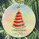 Christmas in July Watermelon Ceramic Ornament<br><div class="desc">These fun Christmas in July ornament is decorated with a red watercolor watermelon Christmas tree on a colorful background.
Because we create our artwork you won't find this exact image from other designers.
Original Watercolor © Michele Davies.</div>