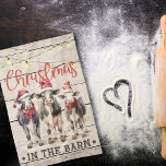 Christmas in the Barn Cows Wearing Santa Hats Kitchen Towel<br><div class="desc">Enjoy this cute,  farmhouse "Christmas in the barn" kitchen towel with red and brown typography,  three holstein cows wearing red Santa hats,  and string lights.  Light wooden board background.  A wonderful addition to a farmhouse or barndo style kitchen for Christmas.</div>