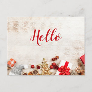Christmas Items on a Rustic Wooden Board Hello Postcard