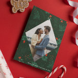 Christmas Kiss Mistletoe Romantic Photo Diamond Holiday Card<br><div class="desc">Christmas kisses and holiday wishes abound with this festive and romantic mistletoe pattern card. Fill the elegant diamond with your favorite couple kiss photo and add your custom Xmas message in white over the botanical green background. A beautiful mistletoe hangs over your kissing photograph.</div>
