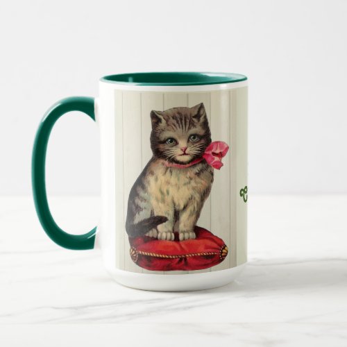 Christmas Kitten Sitting Wearing a Red Bow Mug