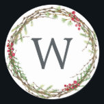 Christmas Monogram Winter Greenery Wreath Berries Classic Round Sticker<br><div class="desc">Rustic monogrammed winter greenery leaves berries wreath Christmas envelope seal or gift sticker. Simply customize the Christmas label by adding your monogram initial. Modern and simple,  red and green Christmas theme. Exclusively designed for you by Happy Dolphin Studio. If you need any help please contact us at happydolphinstudio@outlook.com.</div>