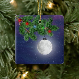 Christmas Moon Ornament Hanging From Pine Bough