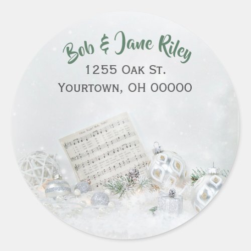 Christmas music and ornaments in sparkling snow classic round sticker