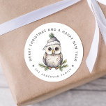 Christmas Owl Personalized Gift And Envelope Classic Round Sticker<br><div class="desc">This holiday season, dress up your gifts and cards with a touch of luxury and style. Our personalized stickers feature a sweet watercolor image of an owl wearing a christmas hat, and are personalized with your family name for an extra special festive feel. Add a luxurious touch to your Christmas...</div>