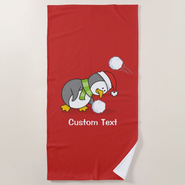 Christmas penguin getting a snow ball beach towel (Front)