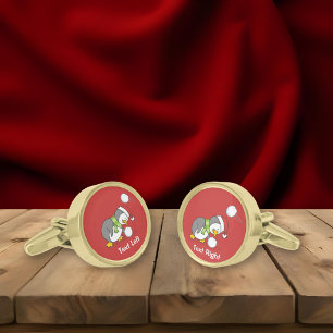 Christmas penguin getting a snow ball cufflinks