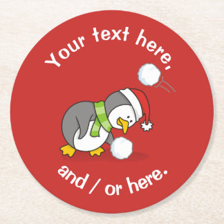 Christmas penguin getting a snow ball round paper coaster