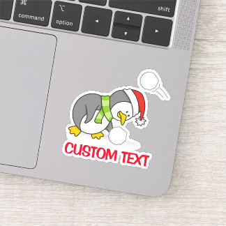 Christmas penguin getting a snow ball sticker