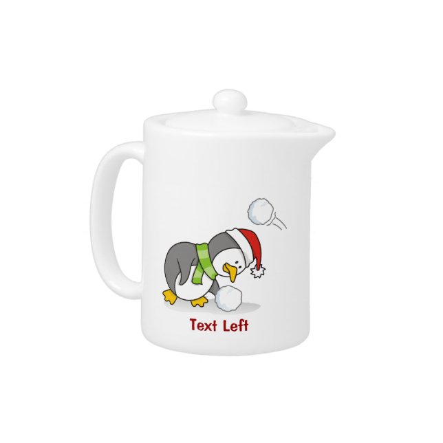 Christmas penguin getting a snow ball teapot (Left)