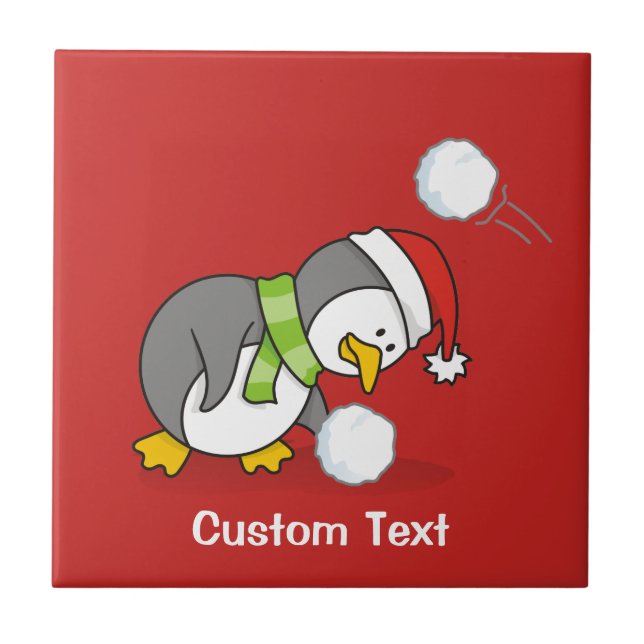 Christmas penguin getting a snow ball tile (Front)