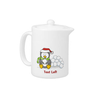 Christmas penguin sitting with snow balls A little Teapot