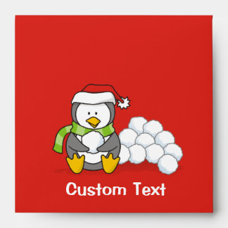 Christmas penguin sitting with snow balls envelope