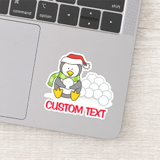 Christmas penguin sitting with snow balls sticker