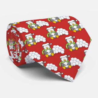 Christmas penguin sitting with snow balls tie