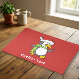 Christmas penguin walking on snow cloth placemat