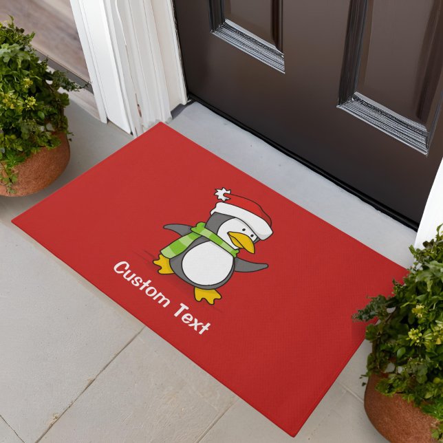 Christmas penguin walking on snow doormat (Creator Uploaded)