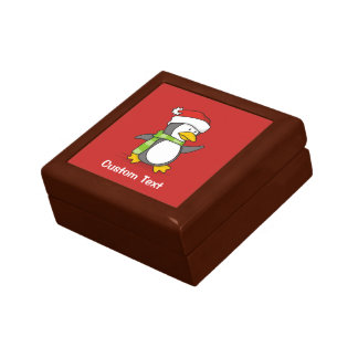 Christmas penguin walking on snow gift box
