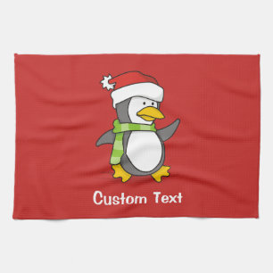 Christmas penguin walking on snow kitchen towel